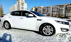 Kia Optima (белая)